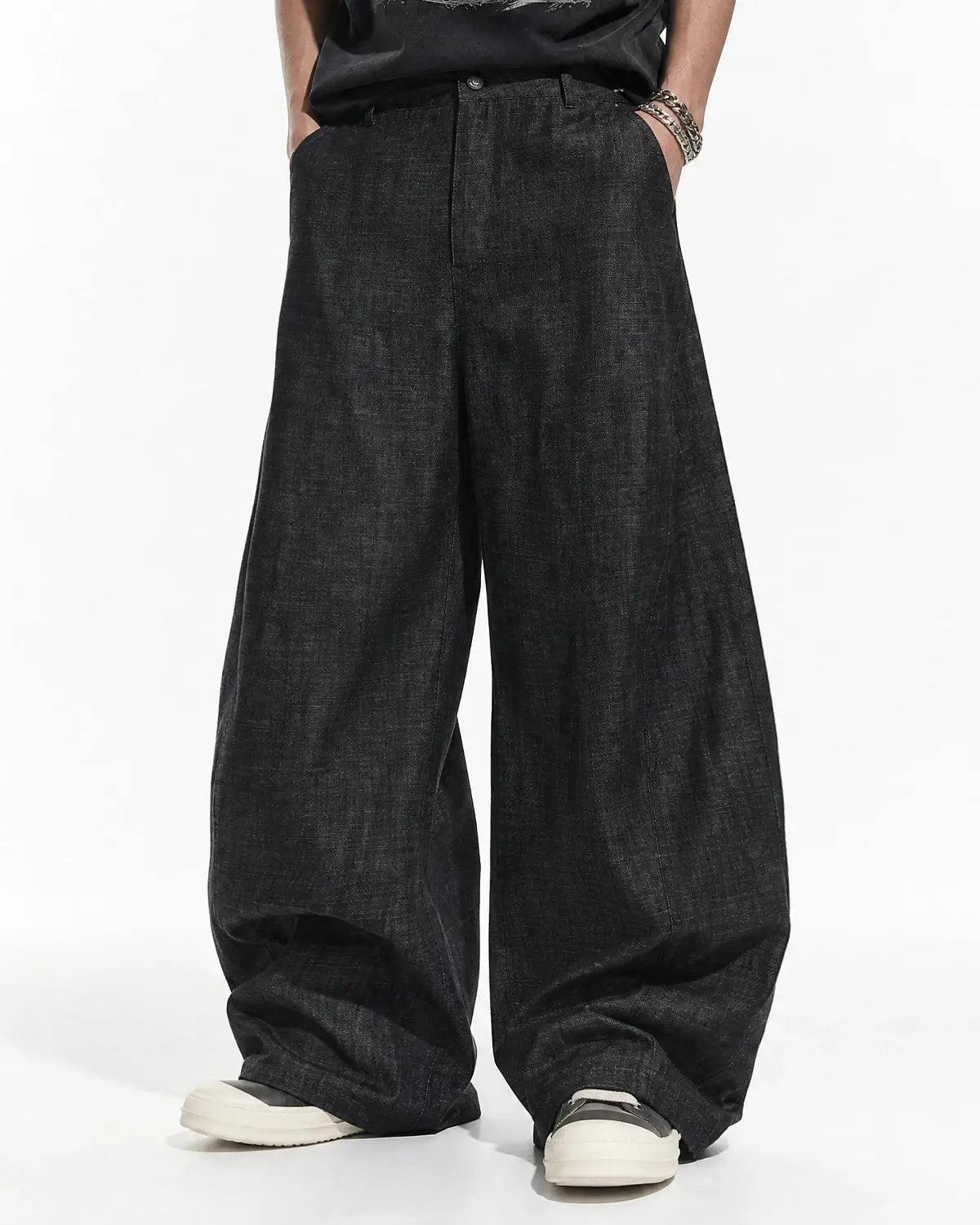 Lightweight raw barrel jeans by INFLATION featuring a relaxed fit, distressed details, and classic denim styling.