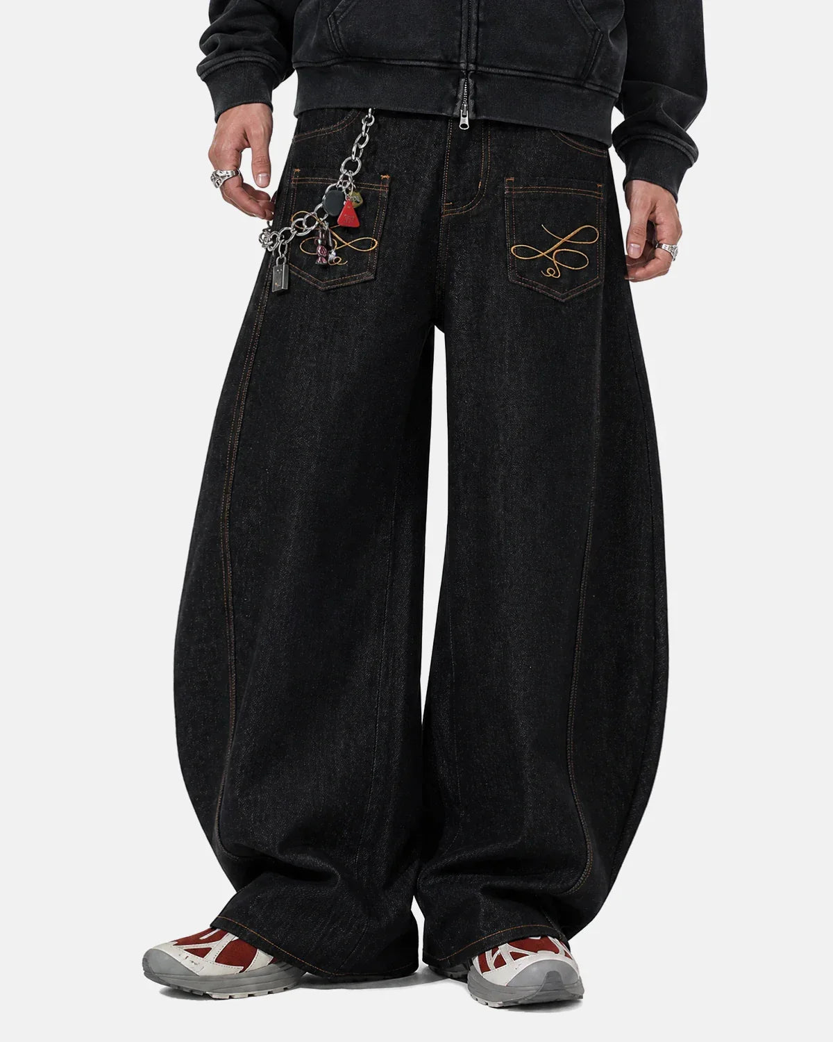 Raw barrel jeans with pocket embroidery from Flation Streetwear, showcasing the textured denim fabric and detailed pocket design.