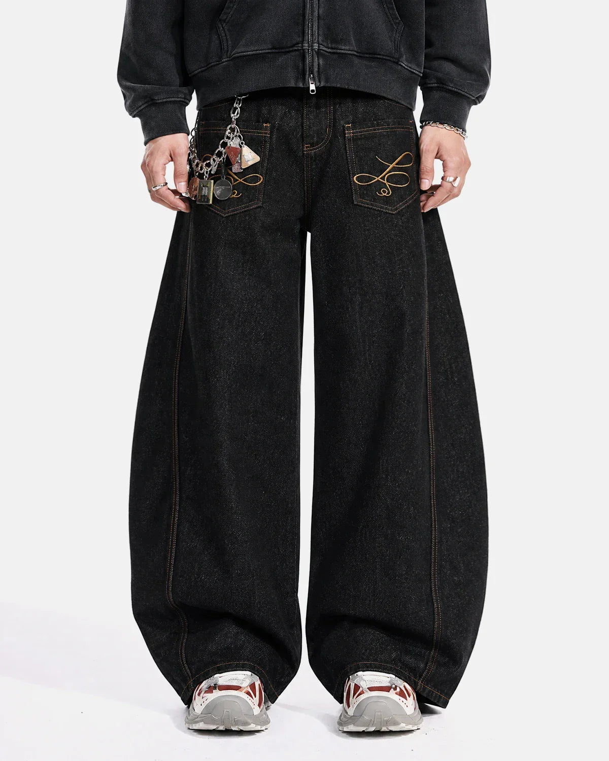 Flation Pocket Embroidery Raw Barrel Jeans showing distressed denim, embroidery details, and a relaxed fit on a mannequin.