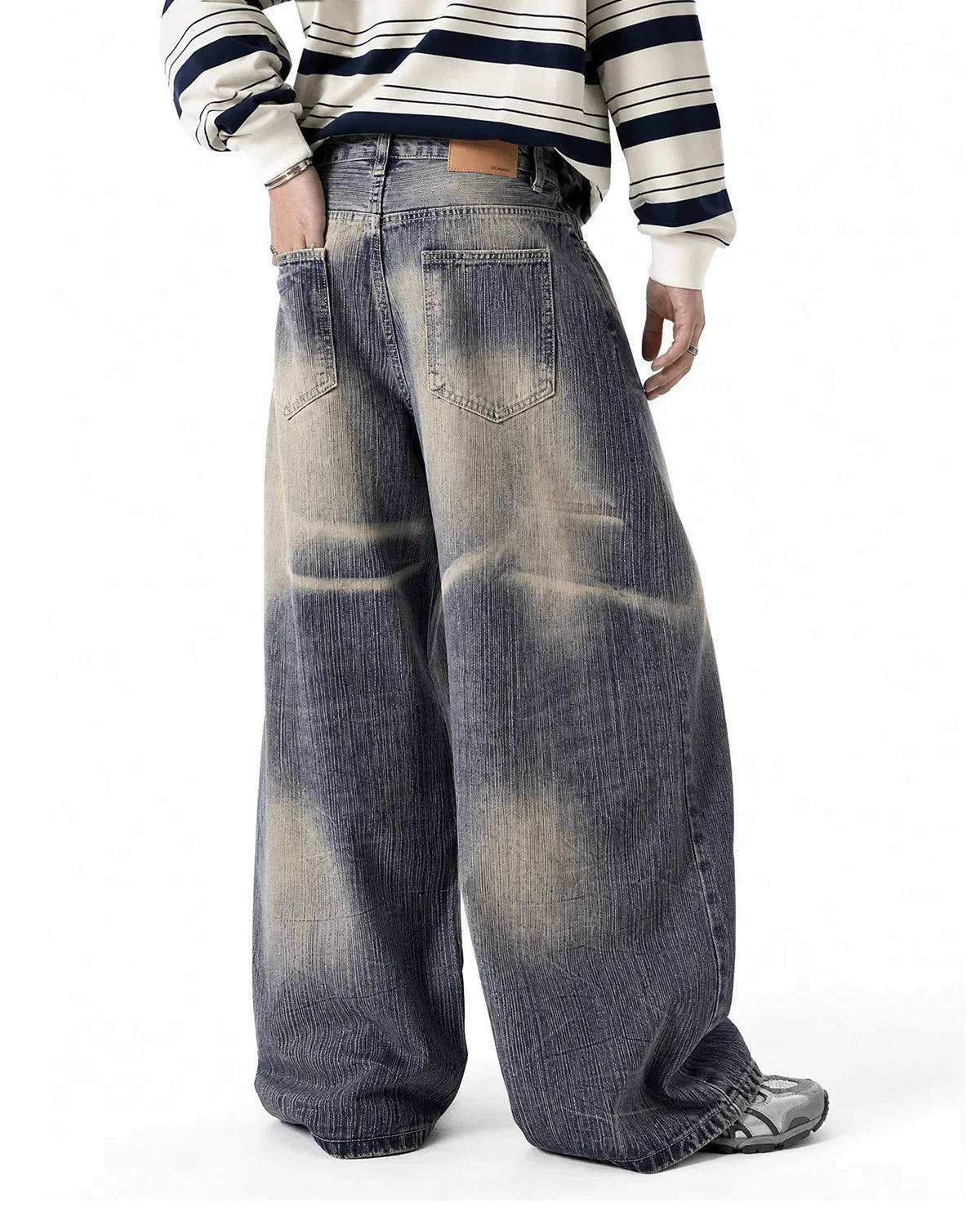Flation Bamboo Weave Dirty Wash Barrel Jeans showing distressed denim fabric and relaxed fit style.