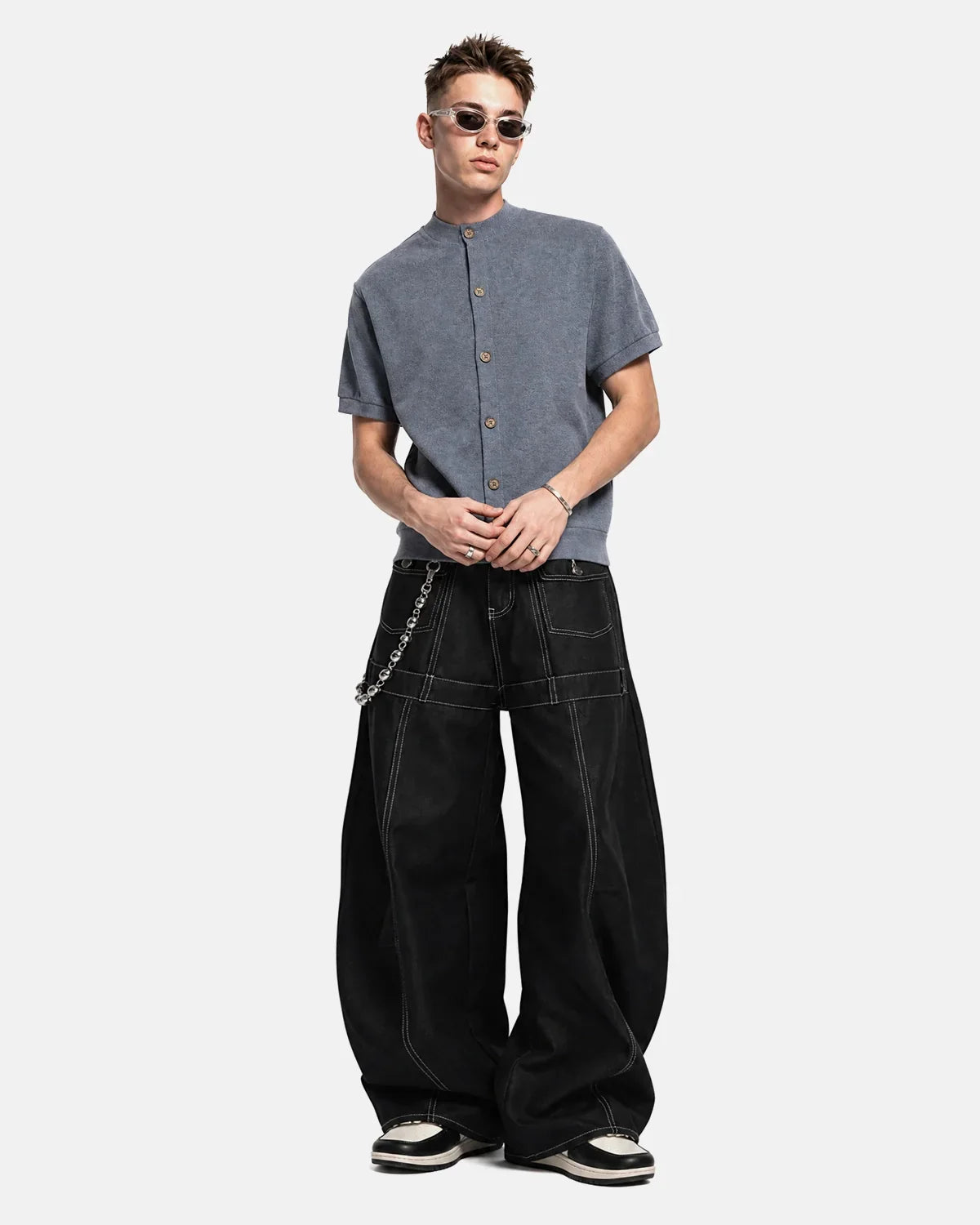 Inflation Contrast Stitch Baggy Barrel Jeans featuring wide fit, distressed denim, and prominent contrast stitching for streetwear style.