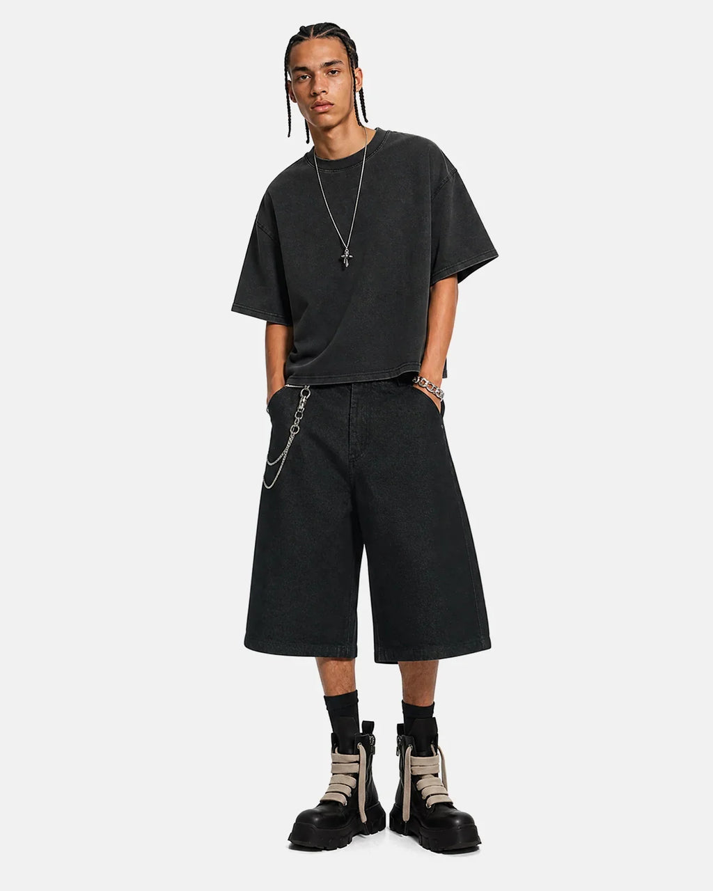 Black baggy long jorts by Flation Streetwear featuring loose fit, knee-length denim shorts with distressed details and casual style.