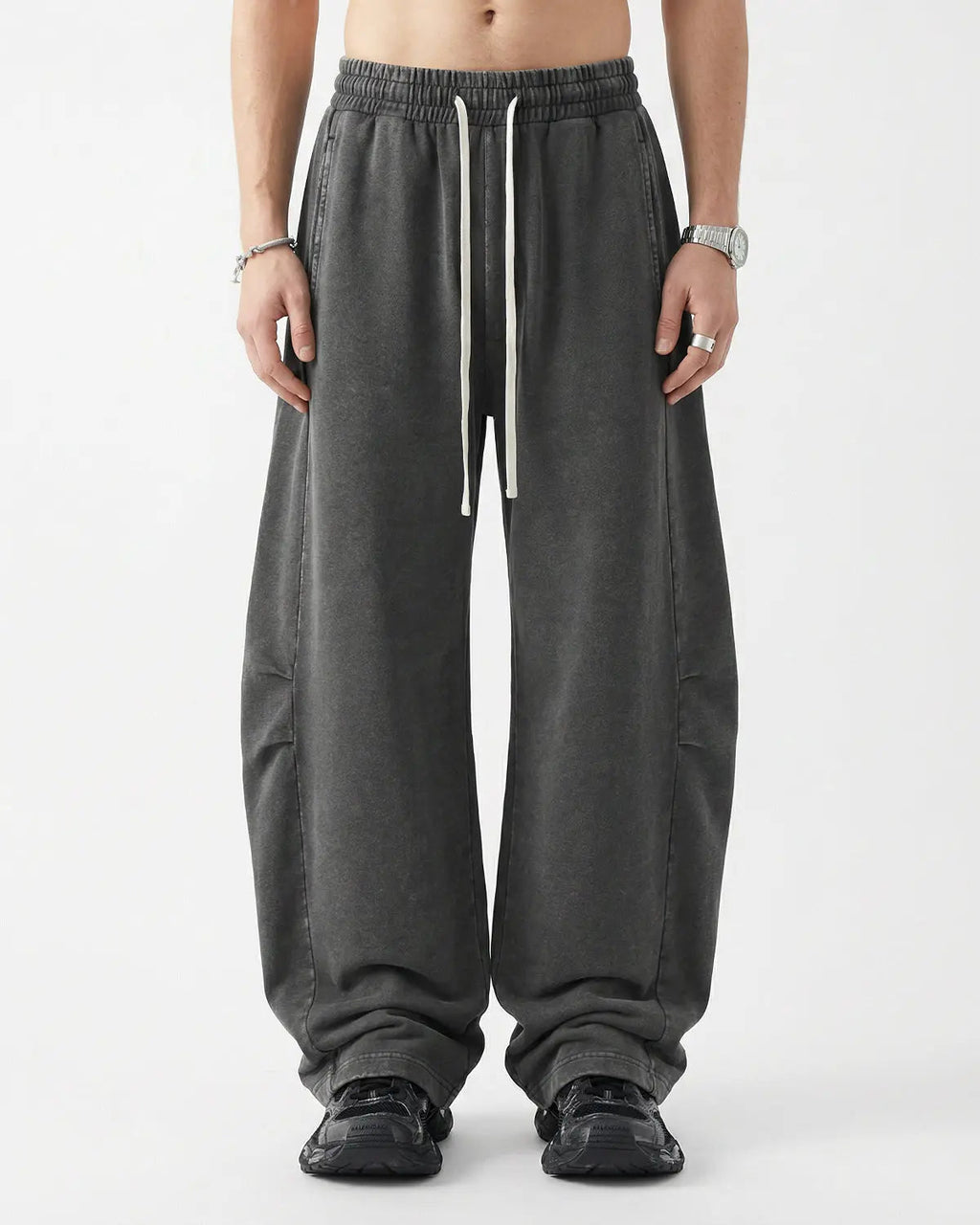 Khaki distressed acid washed barrel sweatpants by Flation Streetwear, relaxed fit with a worn, vintage look.