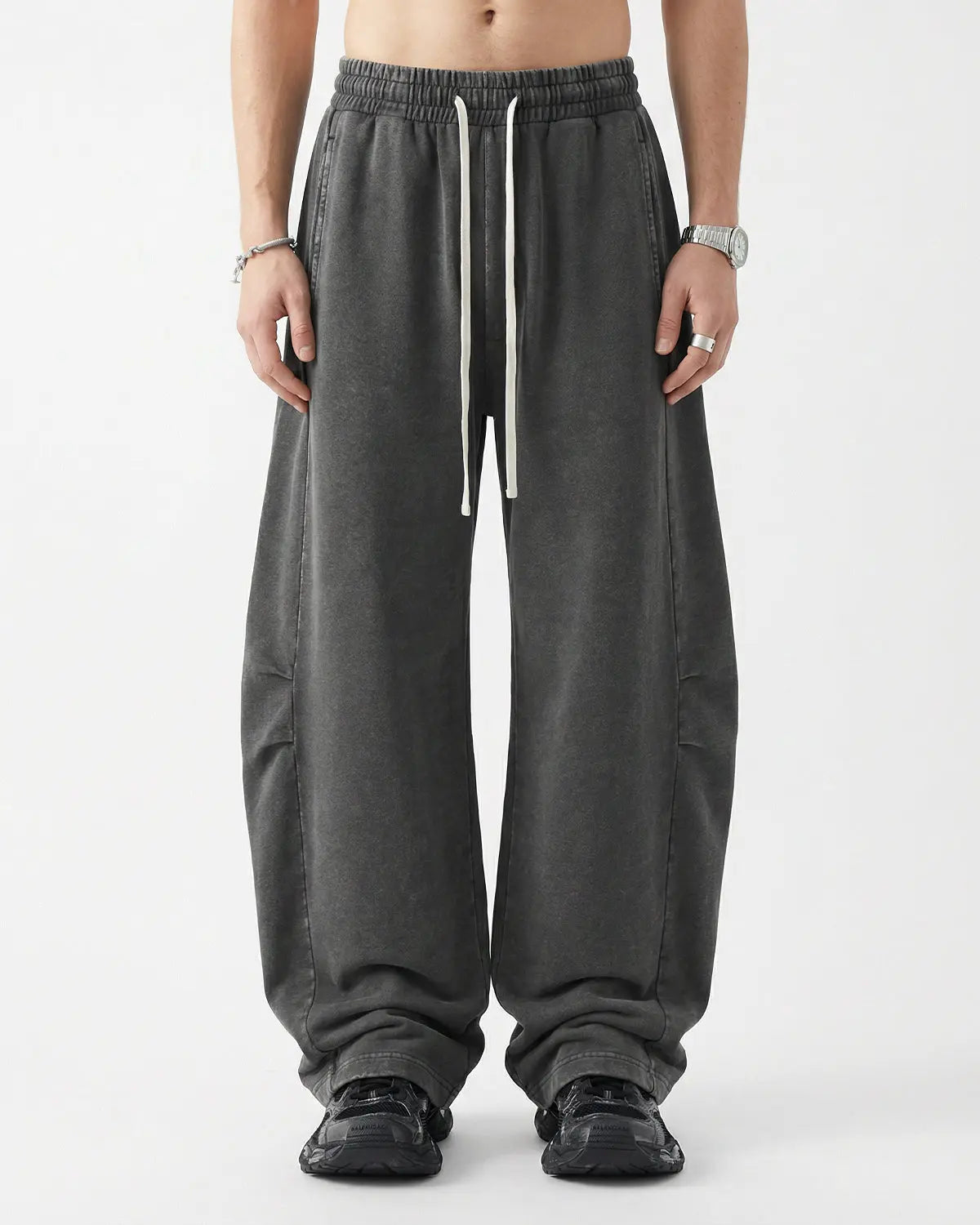 Khaki distressed acid washed barrel sweatpants by Flation Streetwear, relaxed fit with a worn, vintage look.