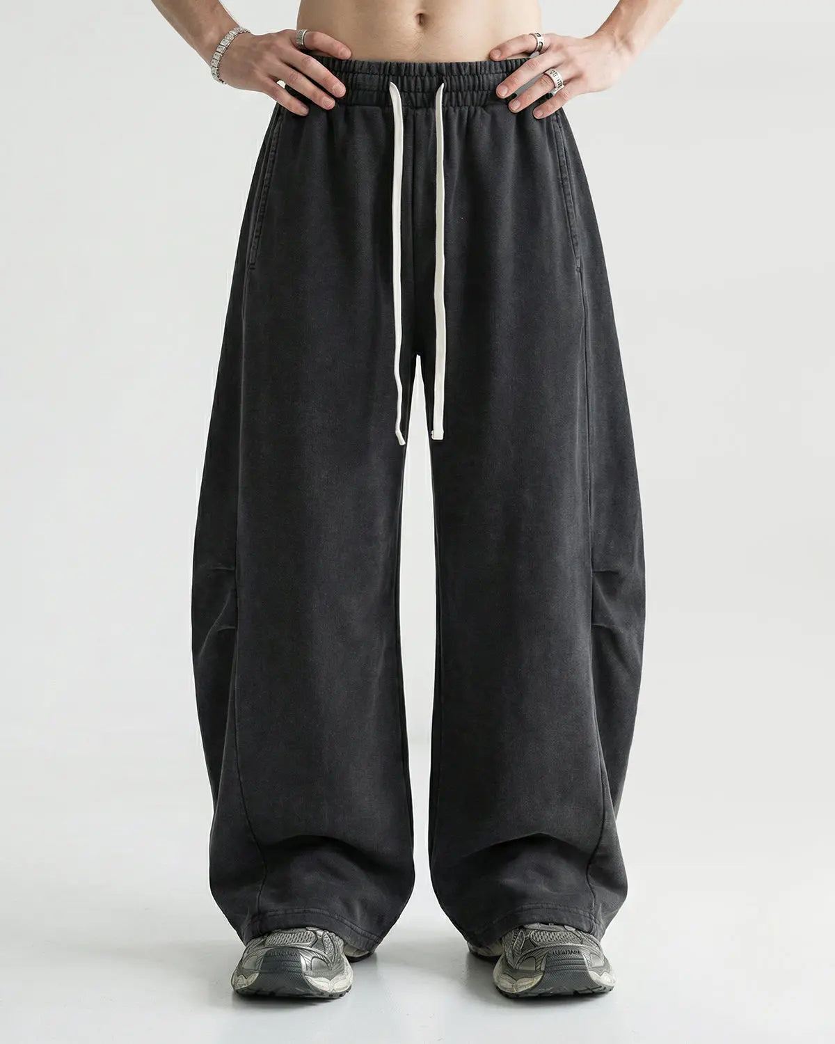 Khaki distressed acid washed barrel sweatpant by Flation Streetwear featuring relaxed fit and vintage-inspired design.