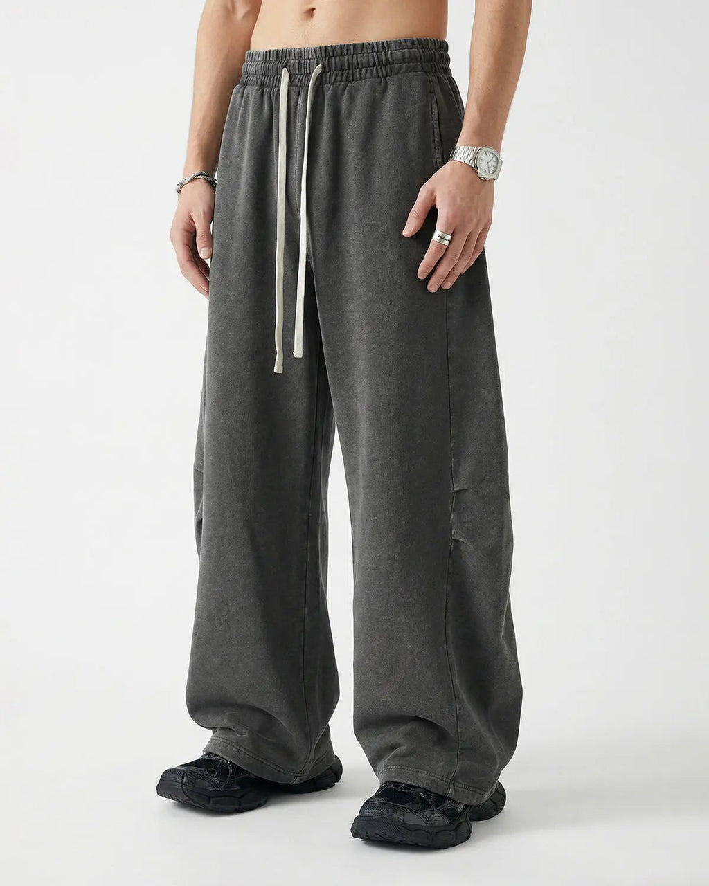 Khaki distressed acid-washed barrel sweatpant by Flation Streetwear, featuring a relaxed fit and vintage-inspired design.