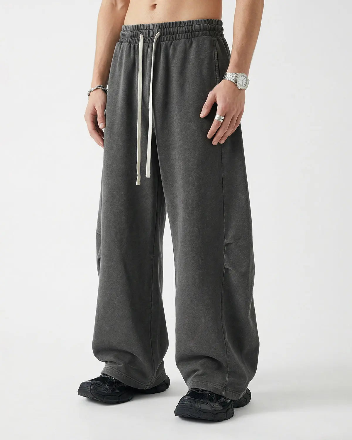 Khaki distressed acid-washed barrel sweatpant by Flation Streetwear, featuring a relaxed fit and vintage-inspired design.