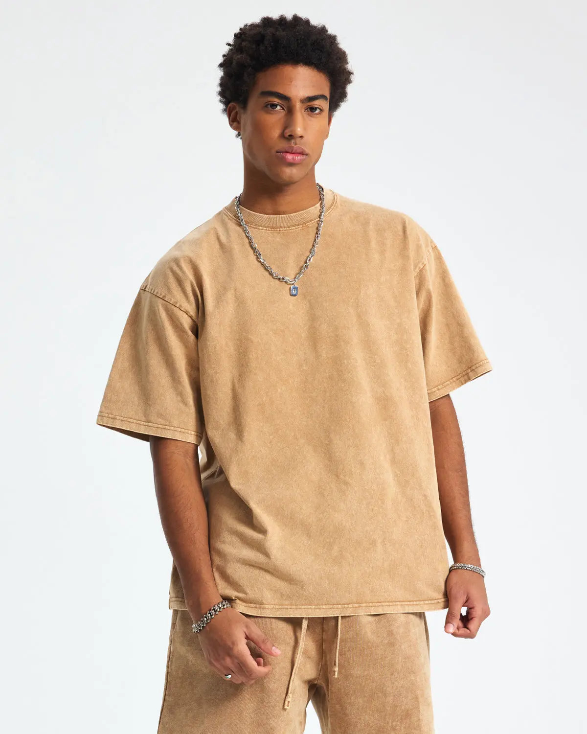 Light blue Flation Snow Washed Oversized T-Shirt with relaxed fit, casual streetwear style, and soft fabric texture.