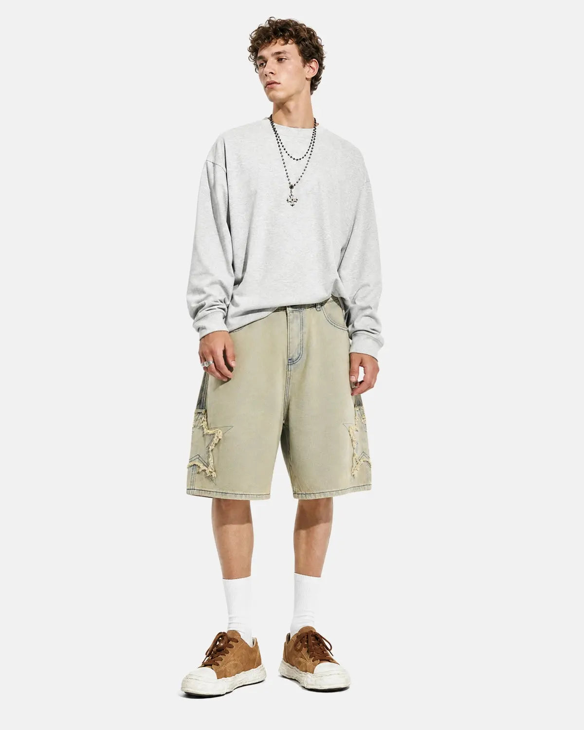 Muddy yellow Star Patch distressed baggy Jorts by Flation Streetwear with ripped details and casual fit.