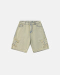 Muddy yellow star patch distressed baggy jorts by Flation Streetwear featuring ripped denim and relaxed fit.