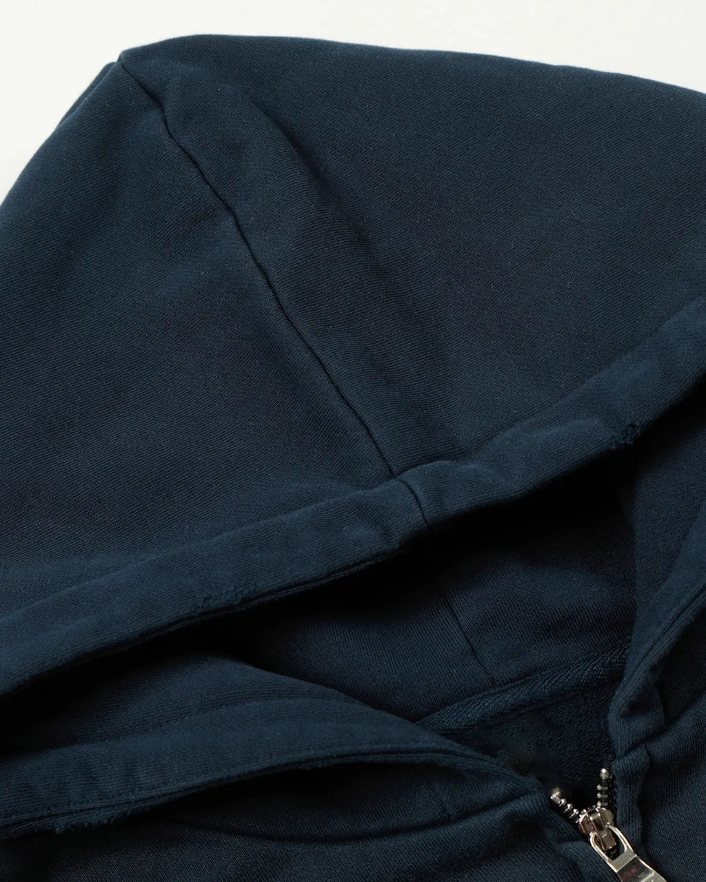Navy blue distressed washed printed zip-up hoodie by Flation Streetwear with graphic design and casual fit.