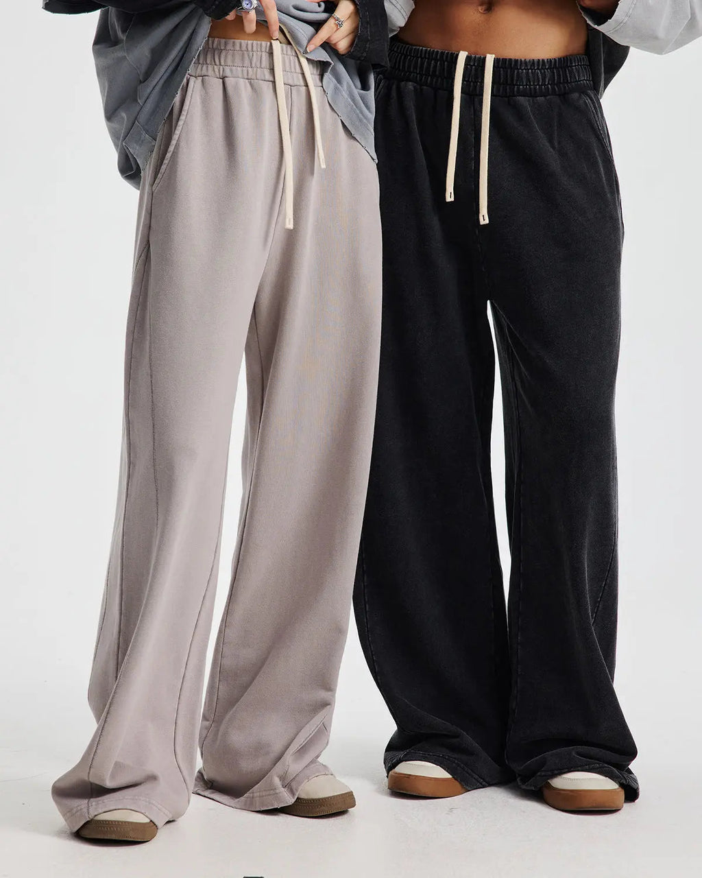 Flation Acid Wash Stitching Straight Leg Sweatpants showing distressed denim-style fabric and detailed stitching on a casual fit pant