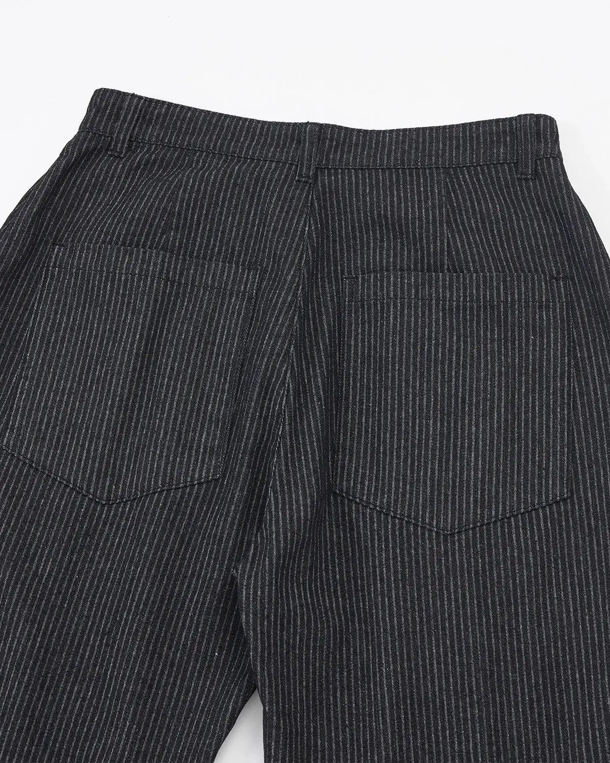 Vintage pinstripe pleated barrel jeans from Flation Streetwear, showing the relaxed fit and stylish pleated design.