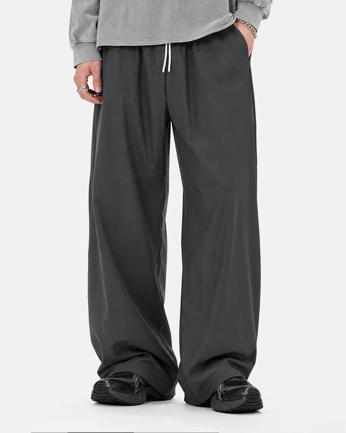 Black Flation AirFlow Cooling Wide-Leg Pants with breathable fabric and relaxed fit, designed for comfort and style.