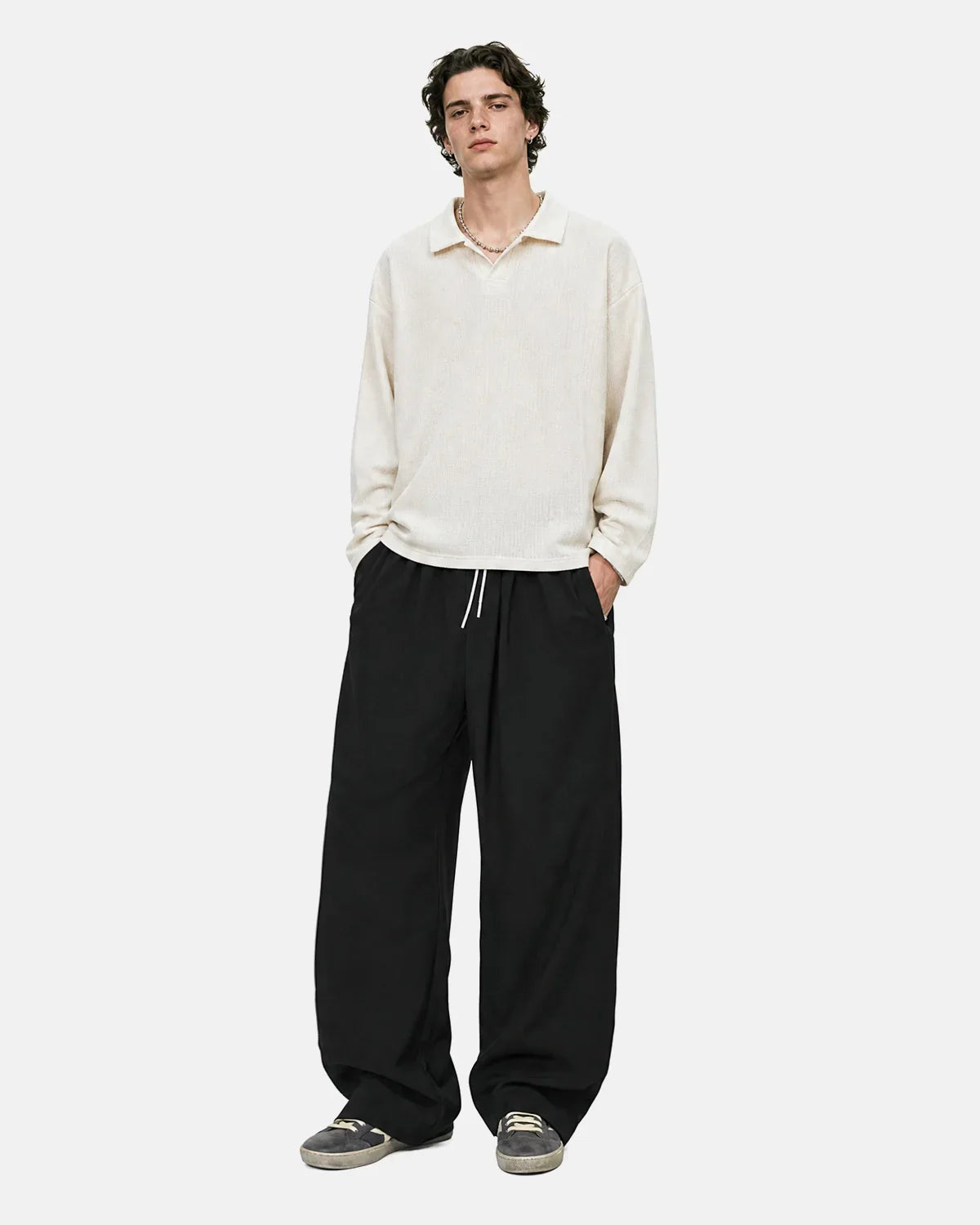 Black Flation AirFlow Cooling Wide-Leg Pants showing relaxed fit and breathable fabric for comfortable wear