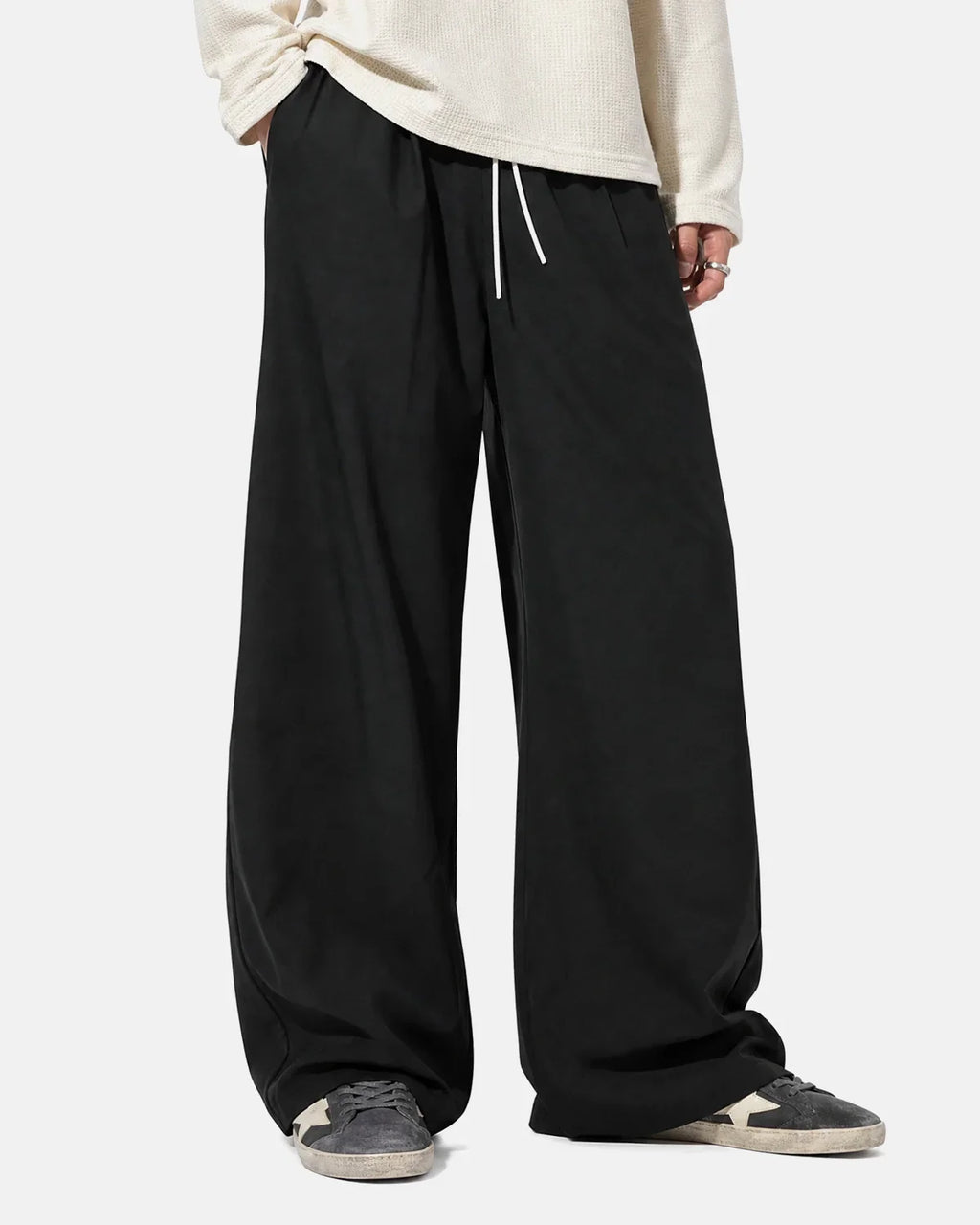 Black Flation AirFlow Cooling Wide-Leg Pants with breathable fabric and relaxed fit, featuring Flation TECHLATION™ technology.
