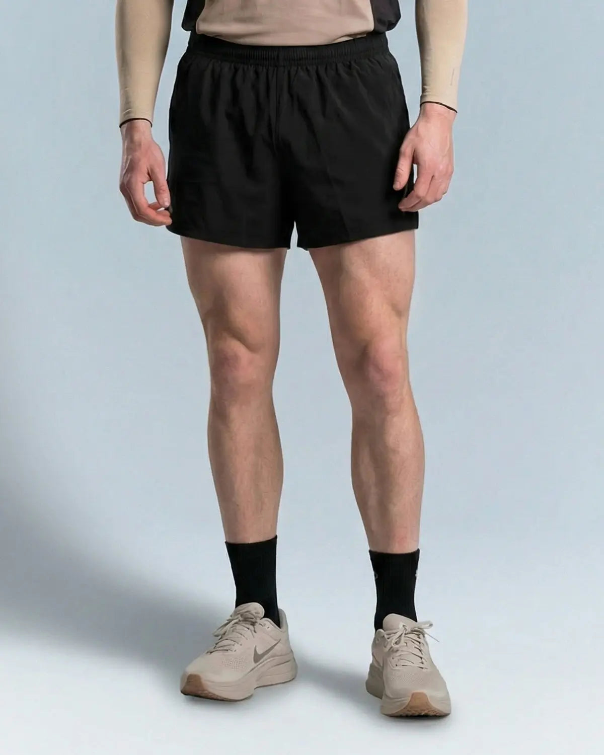 Black Flation AirFlow dual-layer breathable shorts, lightweight athletic pants with moisture-wicking fabric for comfort.