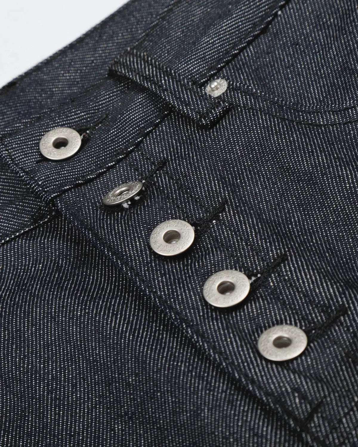 Black baggy denim jorts with button details from Flation Streetwear, featuring a relaxed fit and casual streetwear style.