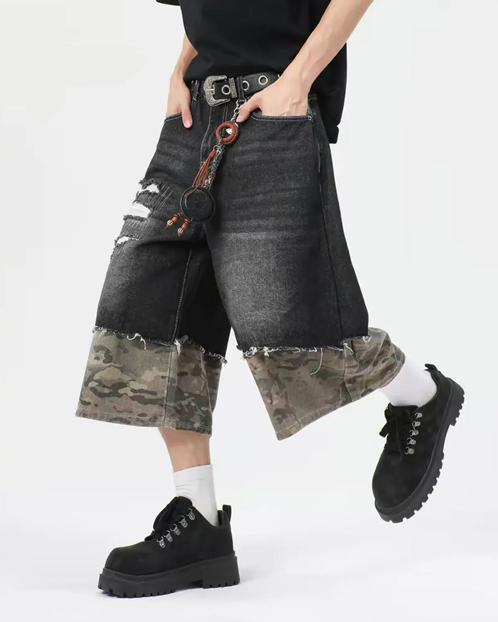 Black camo patchwork washed denim jorts by Flation Streetwear, casual pants with distressed washed denim and patchwork design.