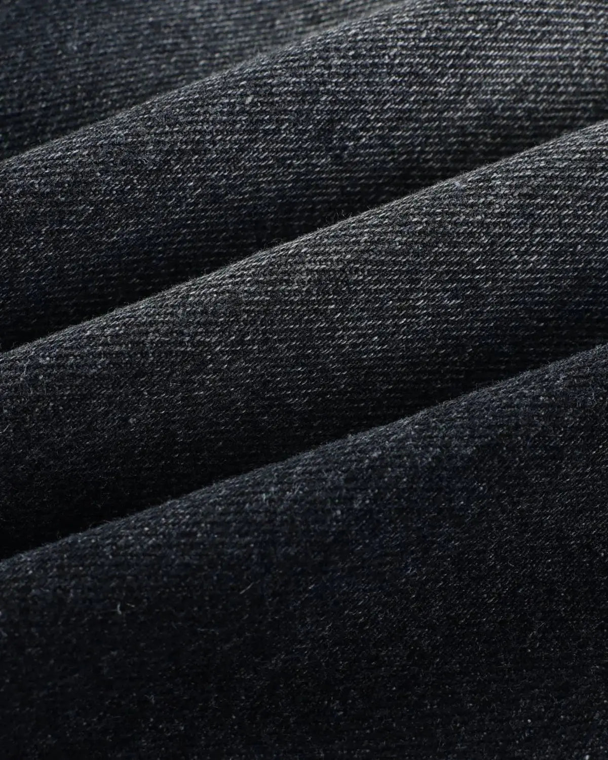 Black camo patchwork washed denim jorts by Flation Streetwear, casual cut-off denim pants with patchwork details.