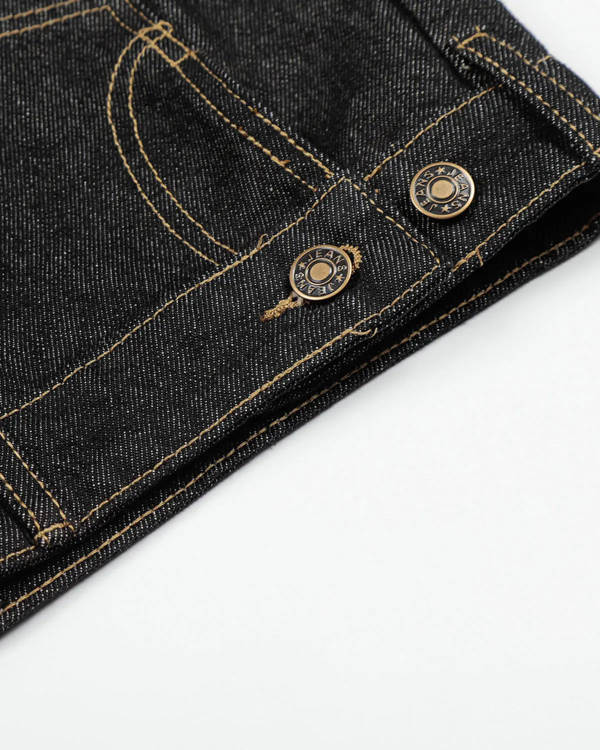 Black deconstructed raw denim jorts by Flation, streetwear pants with distressed details and frayed hems.