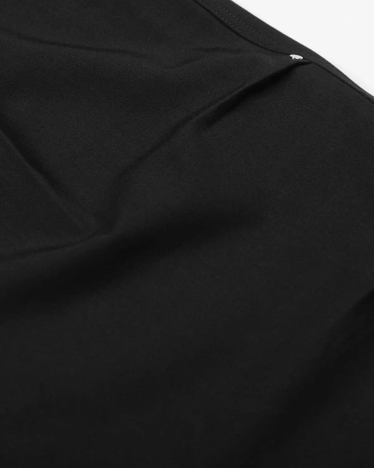Flation Pleated Cinch Back Tailored Shorts in neutral fabric, featuring a high waist, pleats, and a cinch back design.