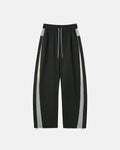 Reflective windbreaker track pants by Flation featuring a sleek streetwear design with reflective accents, casual athletic style.