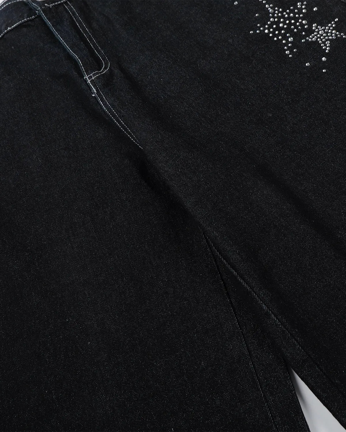 Black denim shorts with star rhinestone embellishments by Flation, featuring a stylish streetwear design.
