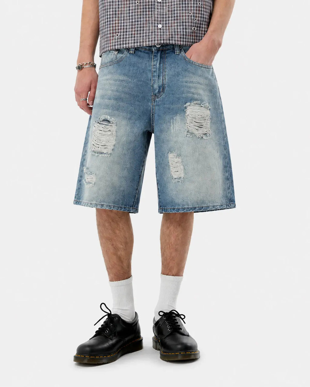 Blue distressed washed knee-length jorts from Flation Streetwear, casual denim pants with a relaxed fit and frayed edges.