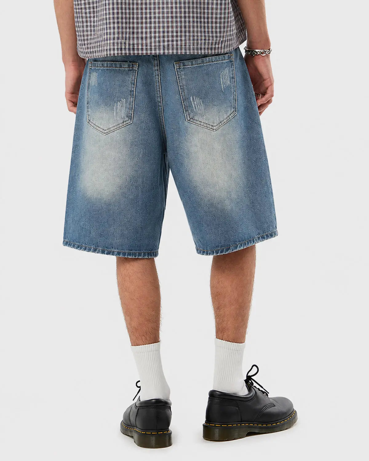 Blue distressed washed knee-length jorts by Flation Streetwear, casual denim pants with a rugged, worn-in look.
