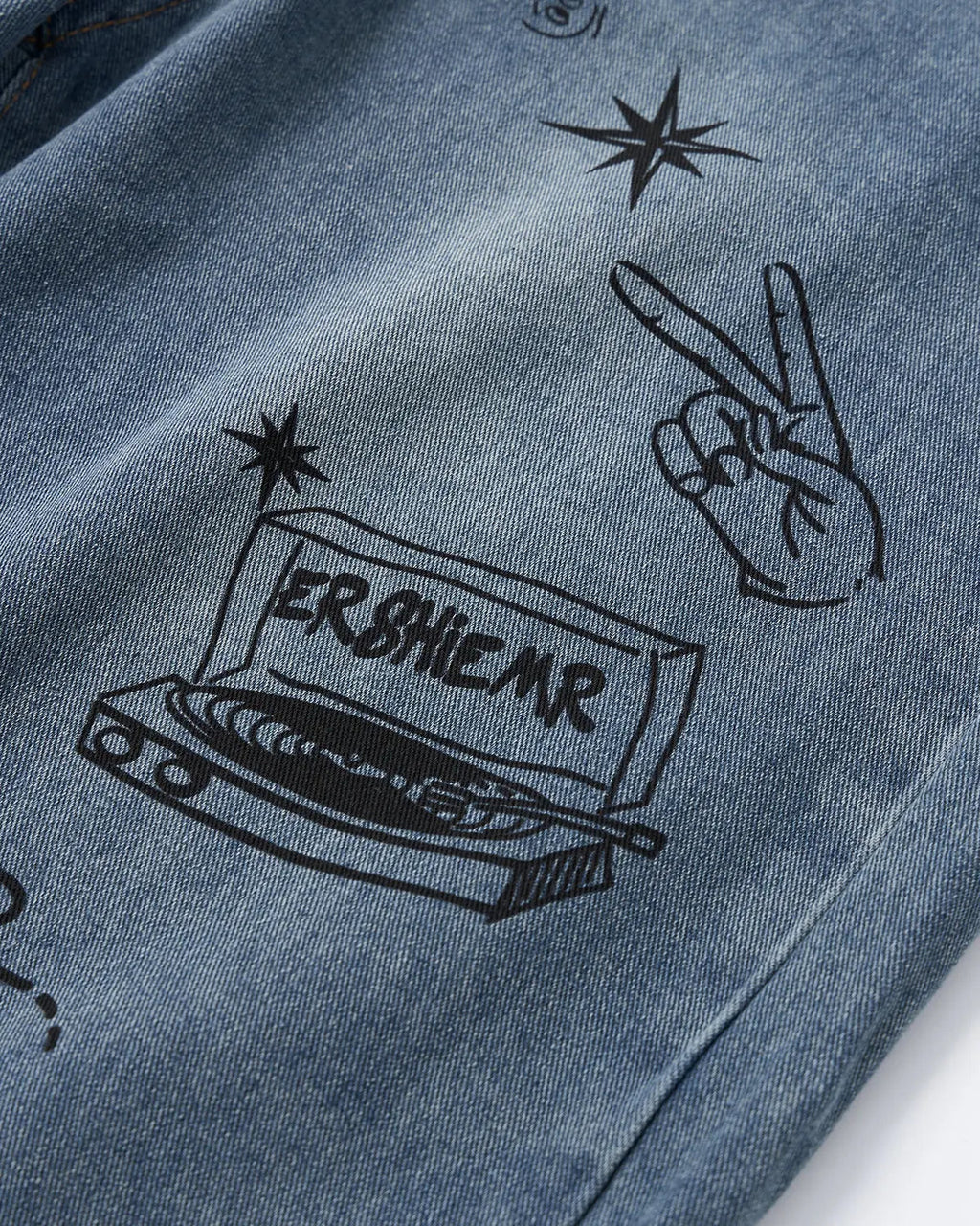 Blue washed graffiti longline jorts by Flation Streetwear, casual pants with a relaxed fit and graffiti design.