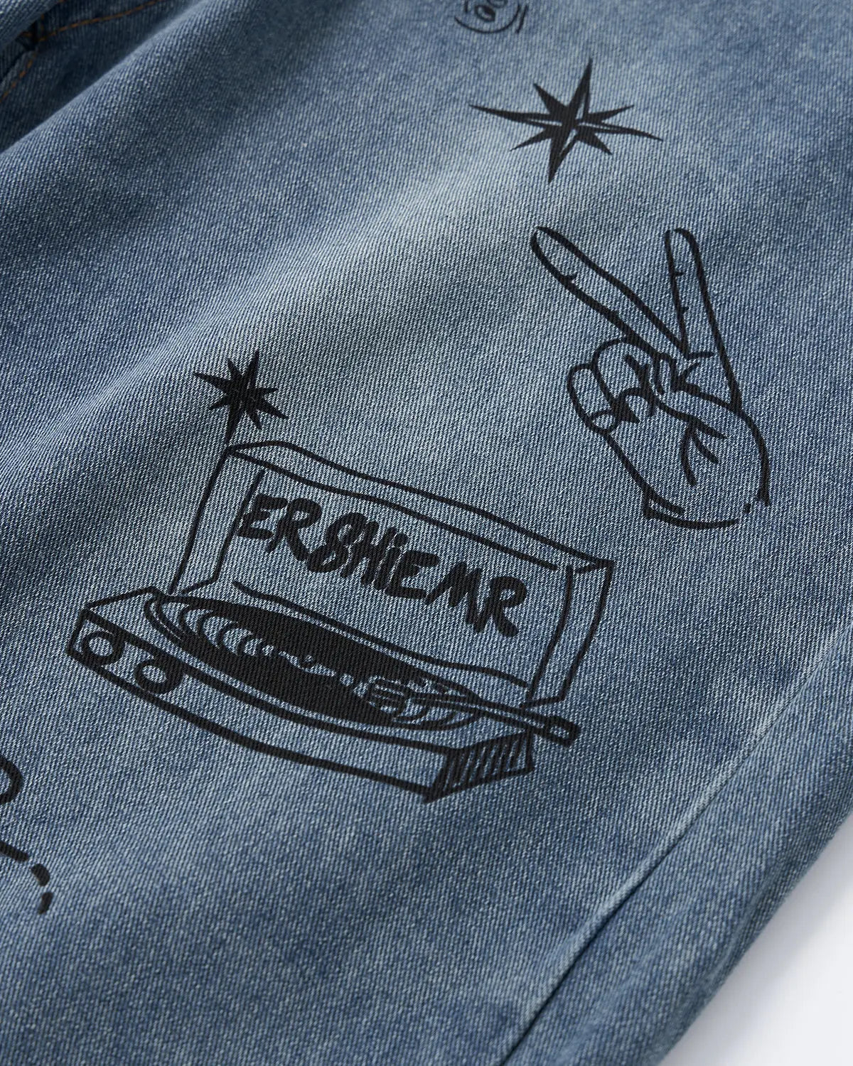 Blue washed graffiti longline jorts by Flation Streetwear, casual pants with a relaxed fit and graffiti design.
