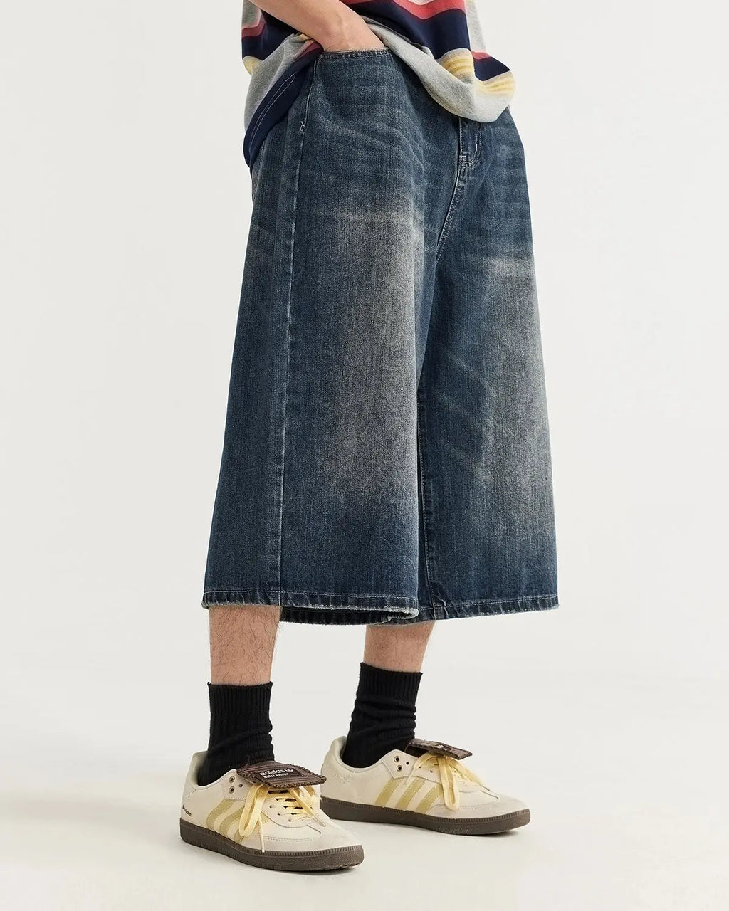 Acid washed longline baggy denim jorts by Flation Streetwear, casual pants with distressed details and relaxed fit.