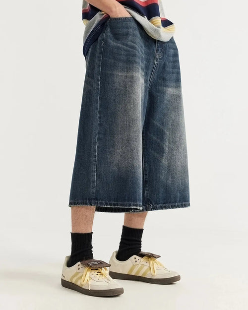 Acid washed longline baggy denim jorts by Flation Streetwear, casual pants with distressed details and relaxed fit.