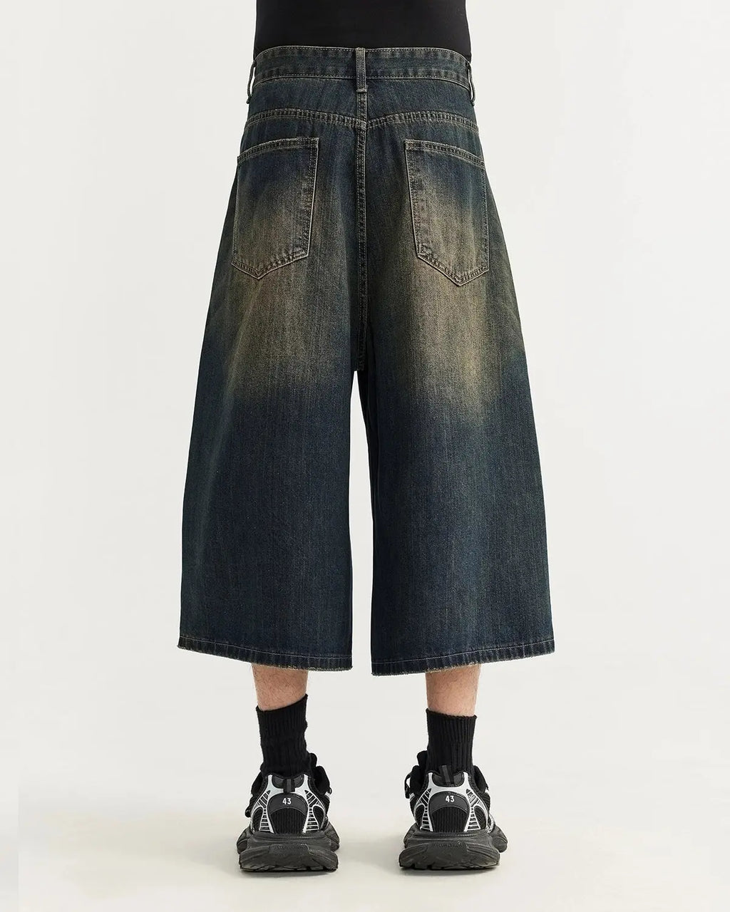 Acid washed longline baggy denim jorts from Flation Streetwear, casual pants with a relaxed fit and distressed denim look.