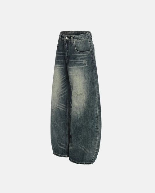Acid washed ripped baggy barrel jeans by Flation Streetwear, featuring distressed details and relaxed fit in denim.