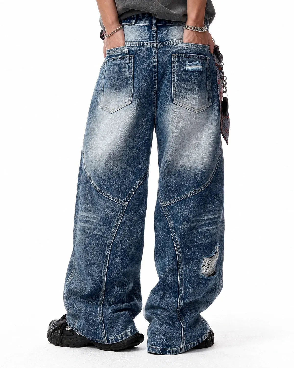 Blue Flation Streetwear Cinch Back Deconstructed Distressed Barrel Jeans, showing fitted waist and distressed denim details.