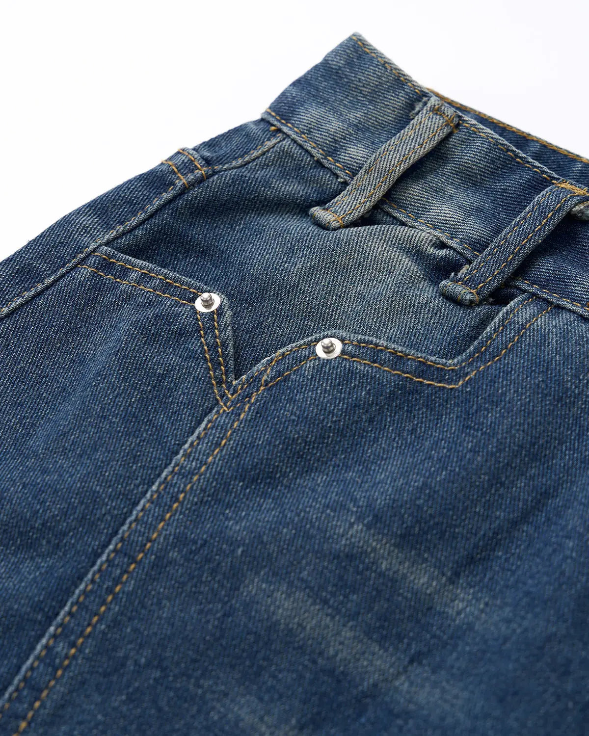 Blue deconstructed washed denim jorts by Flation, casual streetwear pants with distressed details and frayed hems.