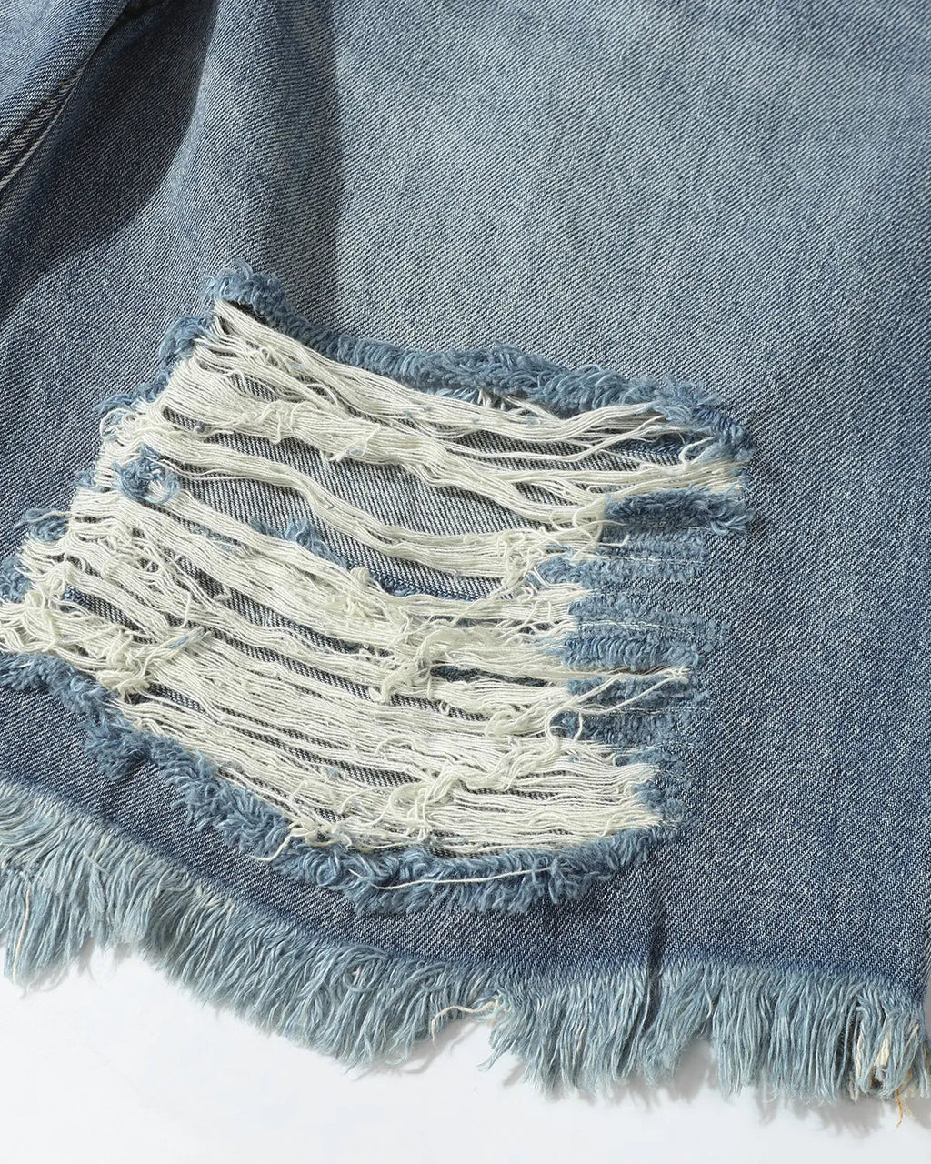 Blue distressed baggy jorts by Flation Streetwear with adjustable waist tabs, casual denim pants for relaxed street style.