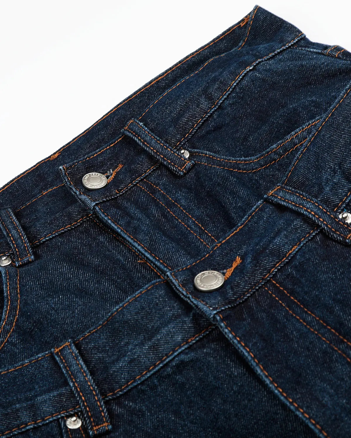 Blue double waist studded denim long jorts by Flation Streetwear, showing the distressed hem and studded details.