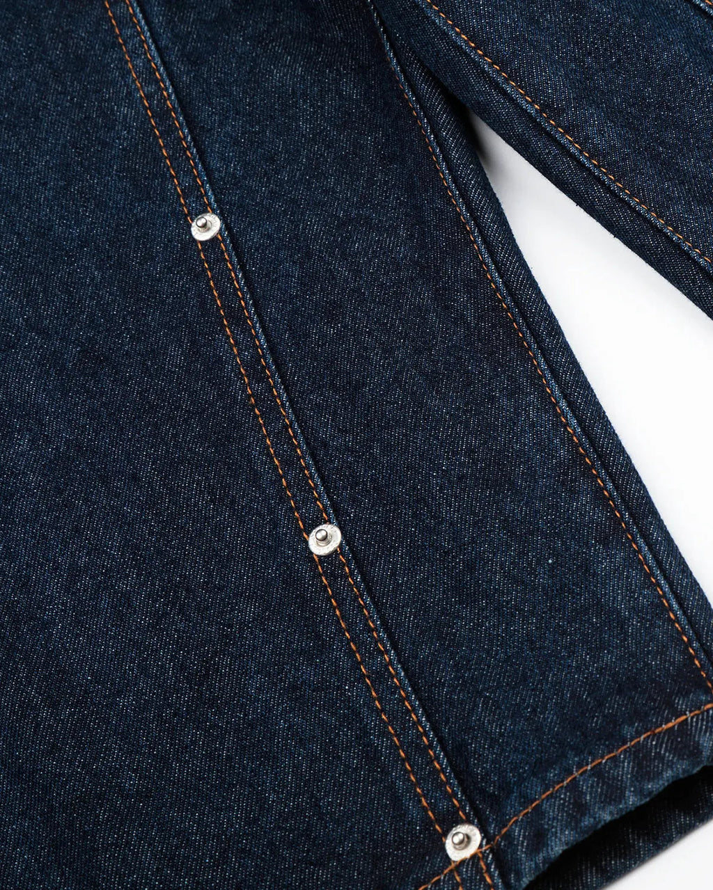 Blue double waist studded denim long jorts by Flation, streetwear pants with distressed detailing and a relaxed fit.