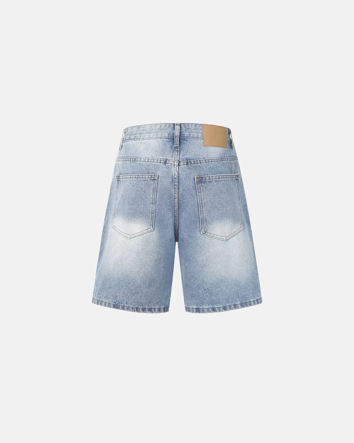 Ripped mid-length washed denim shorts by INFLATION, casual streetwear pants with distressed details and frayed hems.