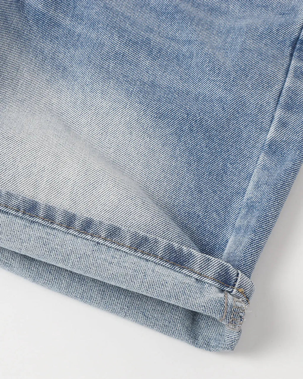 Blue ripped mid-length washed denim shorts by Flation Streetwear, casual pants with distressed details and a relaxed fit.