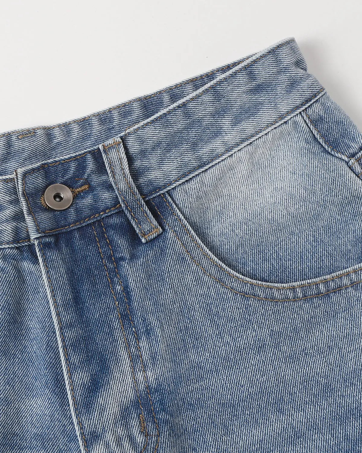 Blue ripped mid-length washed denim shorts by Flation Streetwear, casual pants with distressed details and relaxed fit.