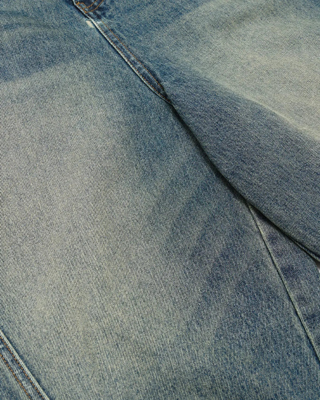 Flation Scimitar Denim Baggy Jorts, casual streetwear pants with a relaxed fit, featuring distressed denim and frayed edges.
