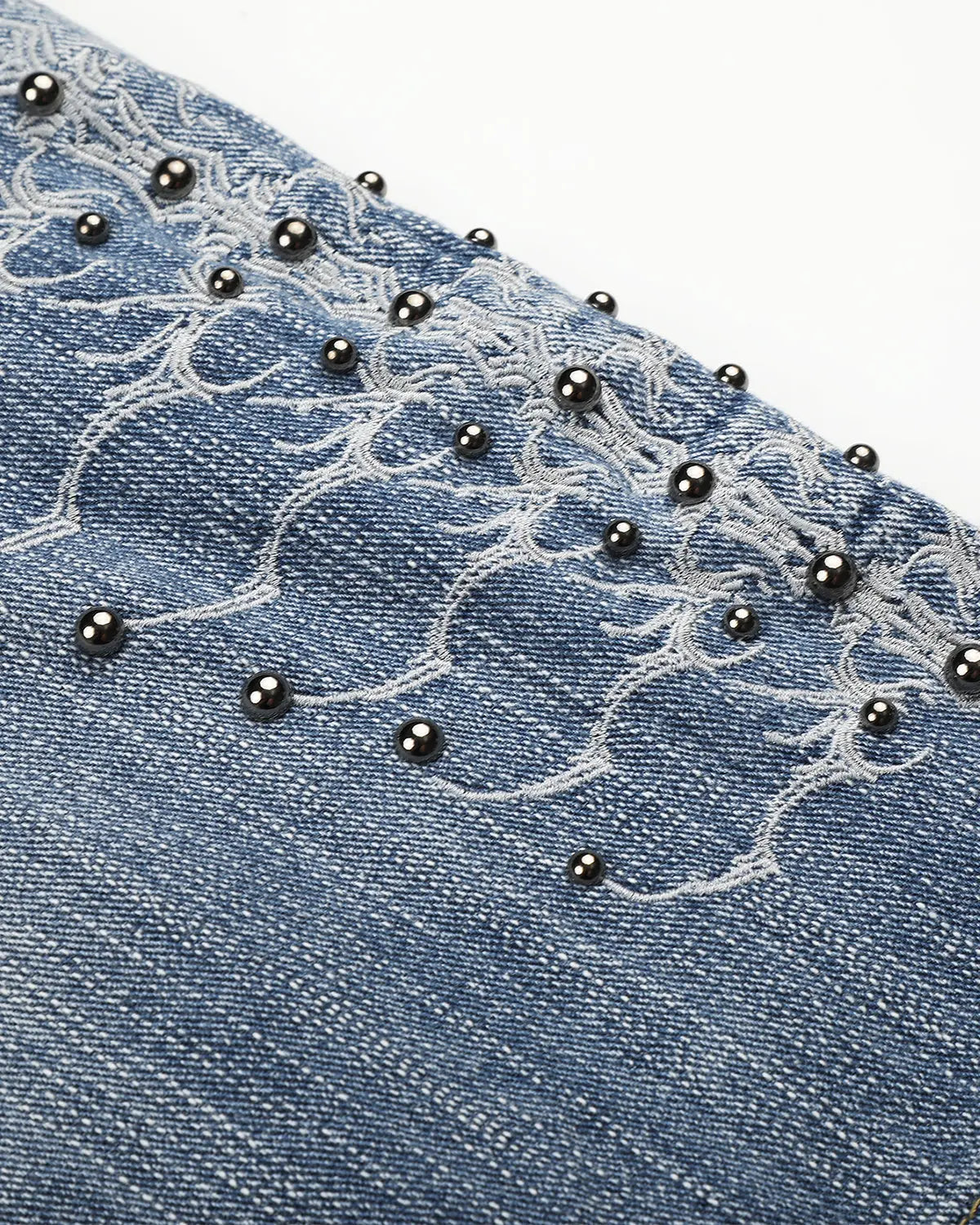 Blue studded bamboo weave jorts by Flation Streetwear, stylish denim-style pants with metal studs and unique woven texture.