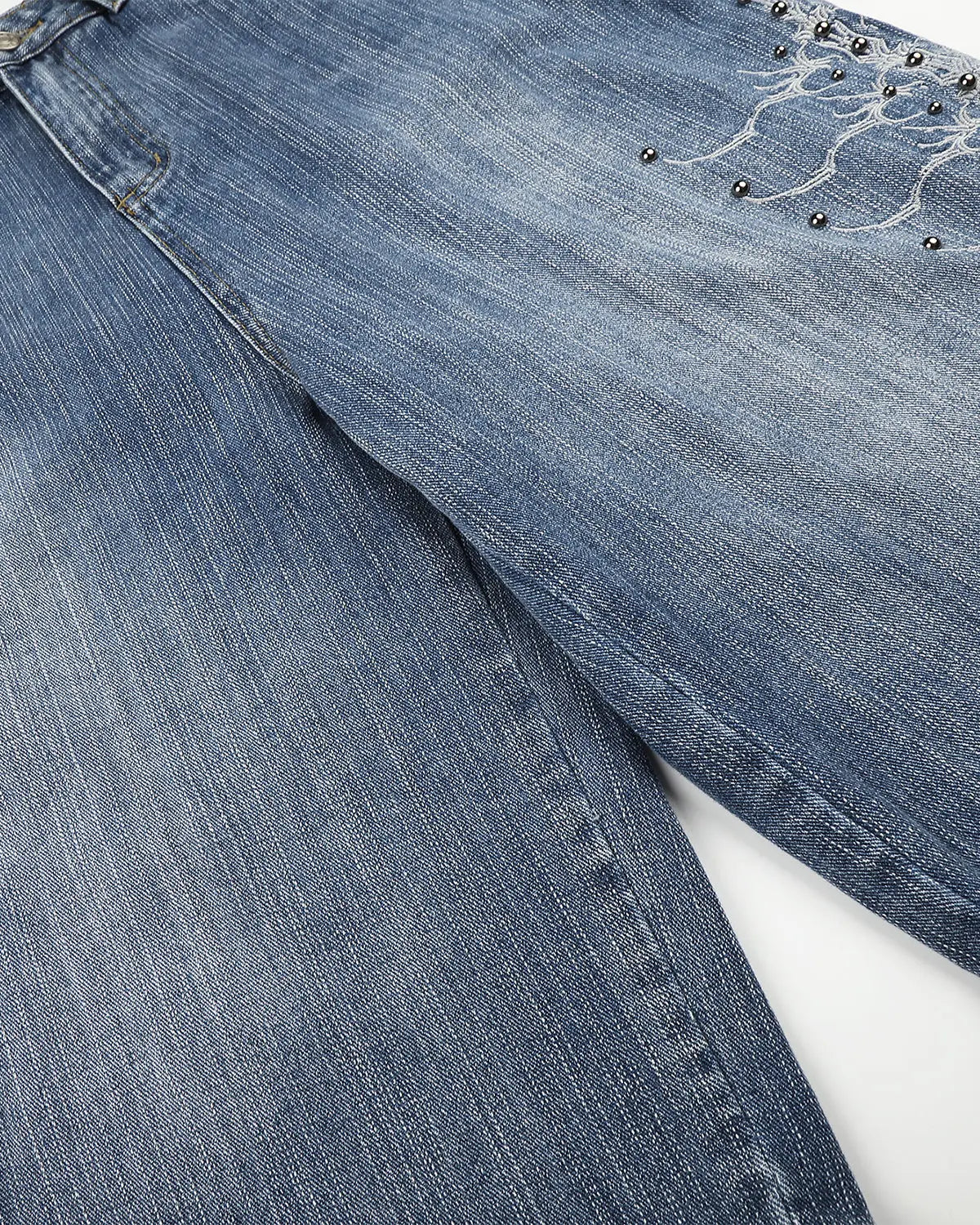 Blue studded bamboo weave jorts by Flation Streetwear, casual pants with a unique textured fabric and fashionable design.
