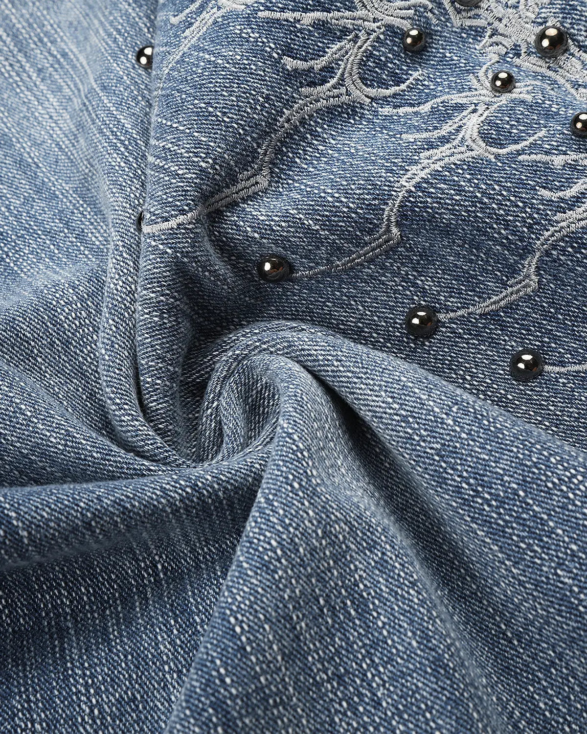 Blue studded bamboo weave jorts by Flation Streetwear, casual denim-style pants with metal stud accents.