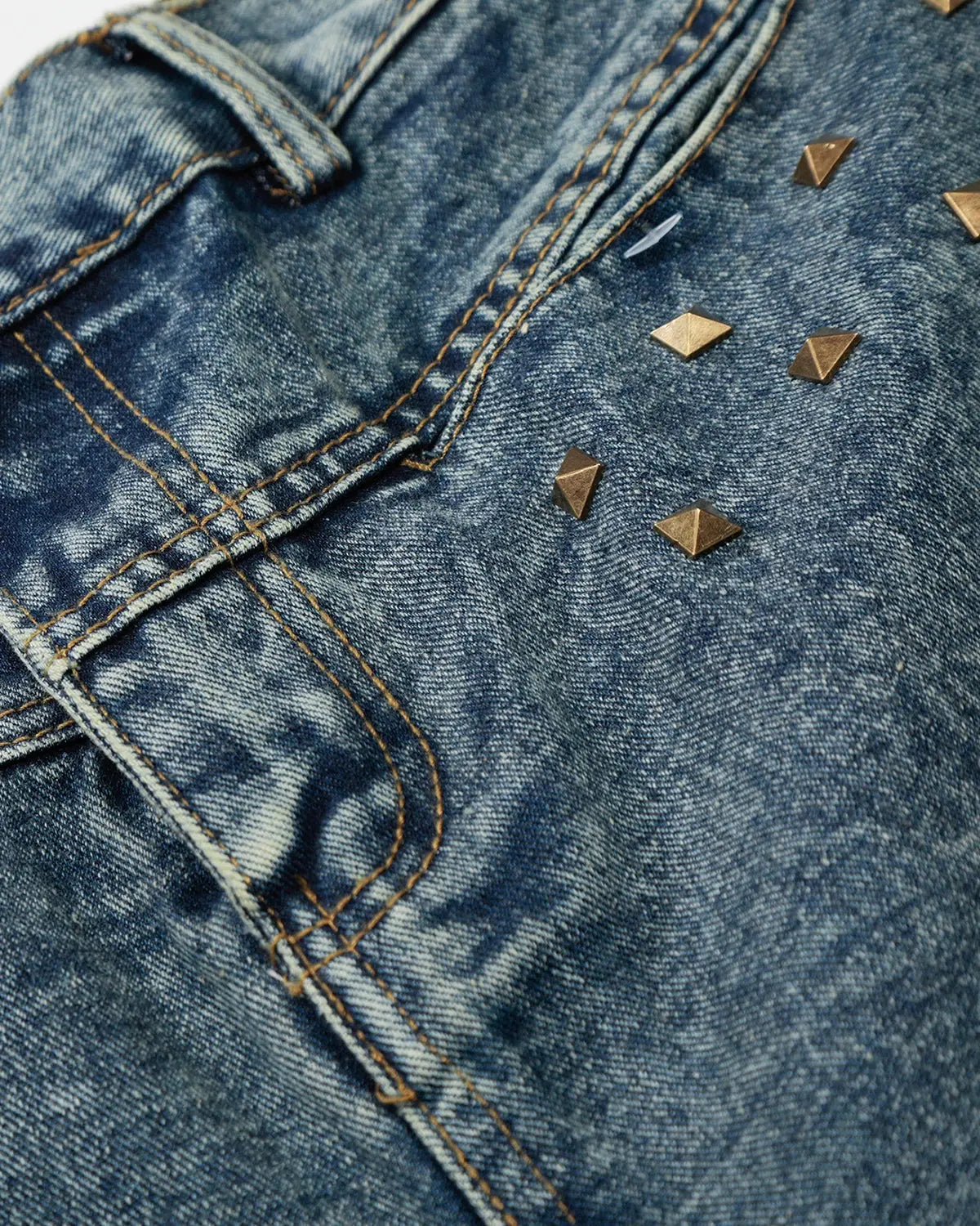 Blue washed long baggy jorts with studded details by Flation Streetwear, casual denim pants with a relaxed fit.
