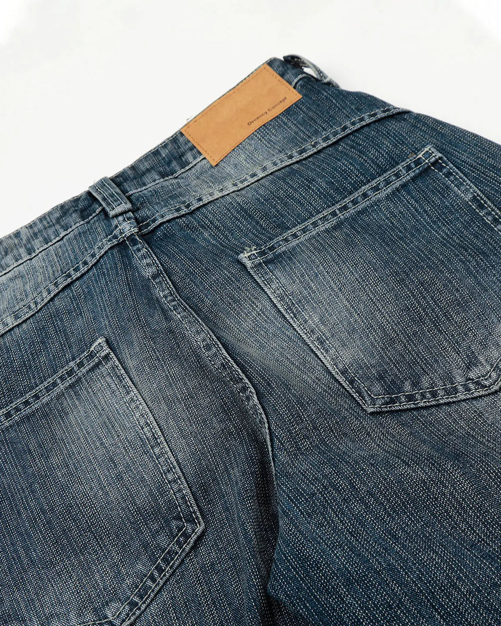 Blue textured bamboo weave denim jeans by Flation Streetwear, showing the detailed fabric and modern pant style.